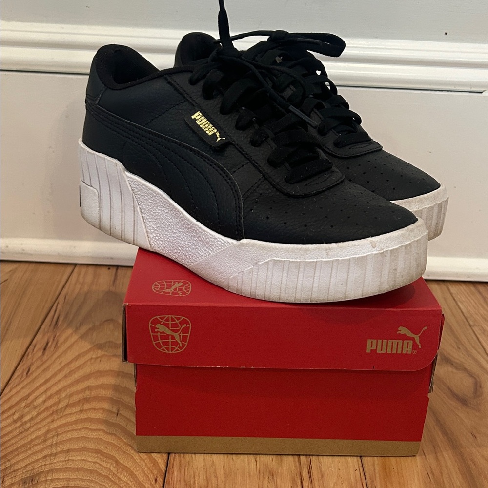Puma Black and White Platform Sneakers with Gold Accents